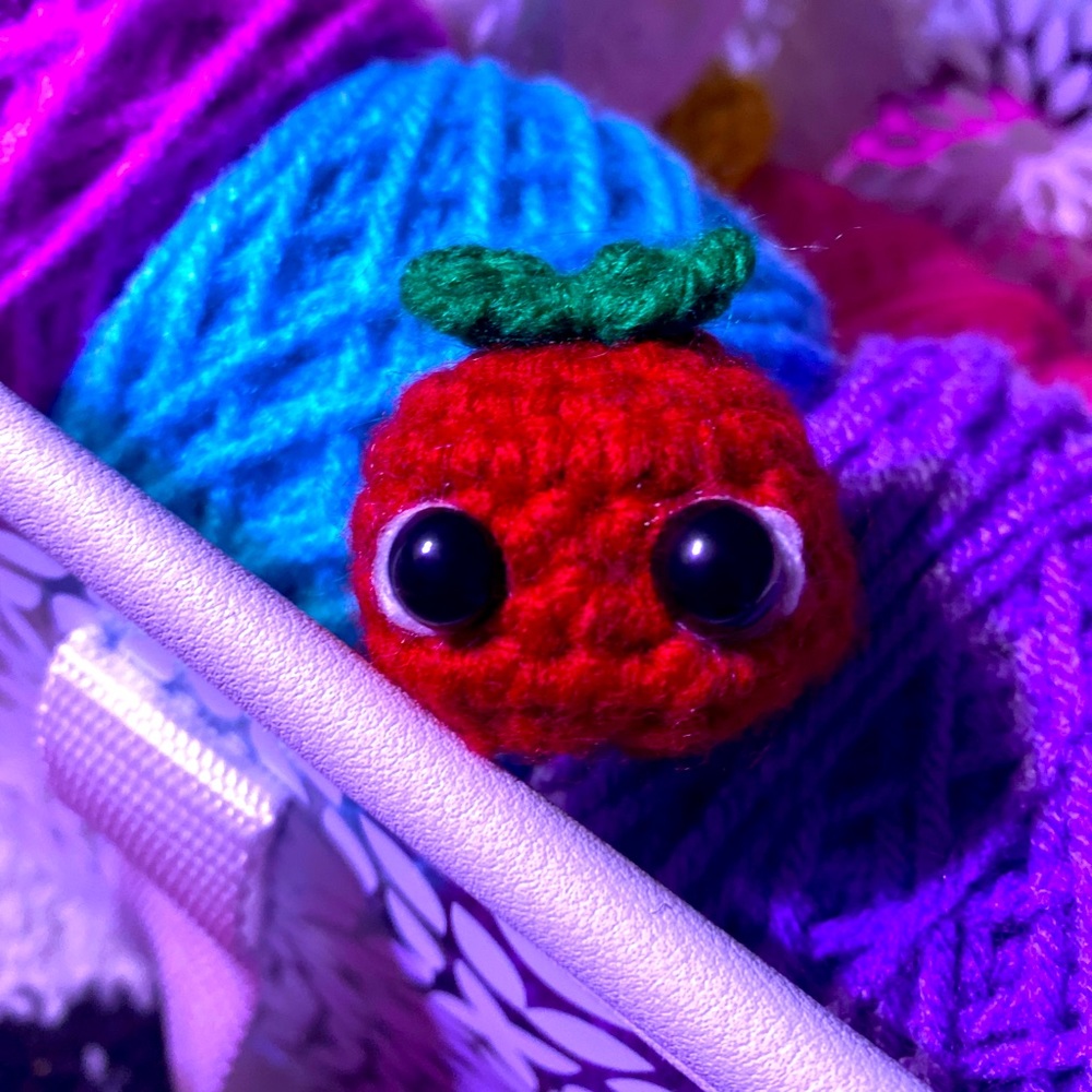 Tiny crochet tomato